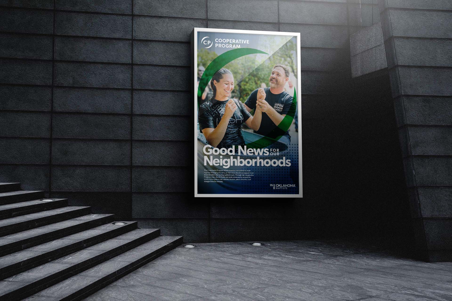 A poster displayed on tiled wall, showing a young woman being baptized outside a local Oklahoma church.