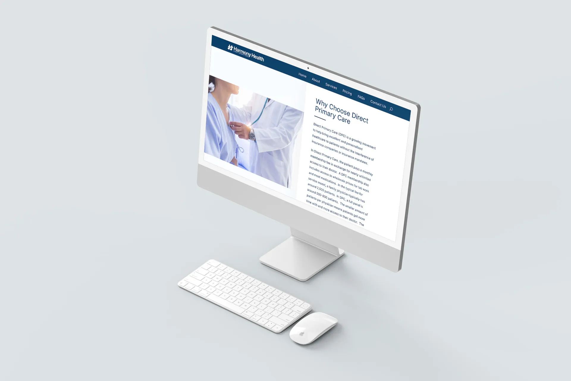 An iMac with the Harmony Health website displayed.